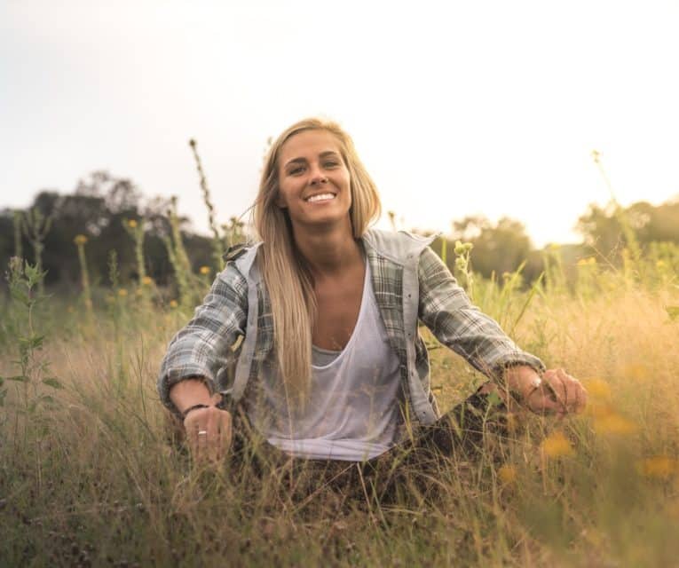 Happy lady in a field