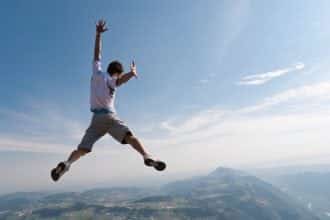 person jumping for joy at being free of drugs