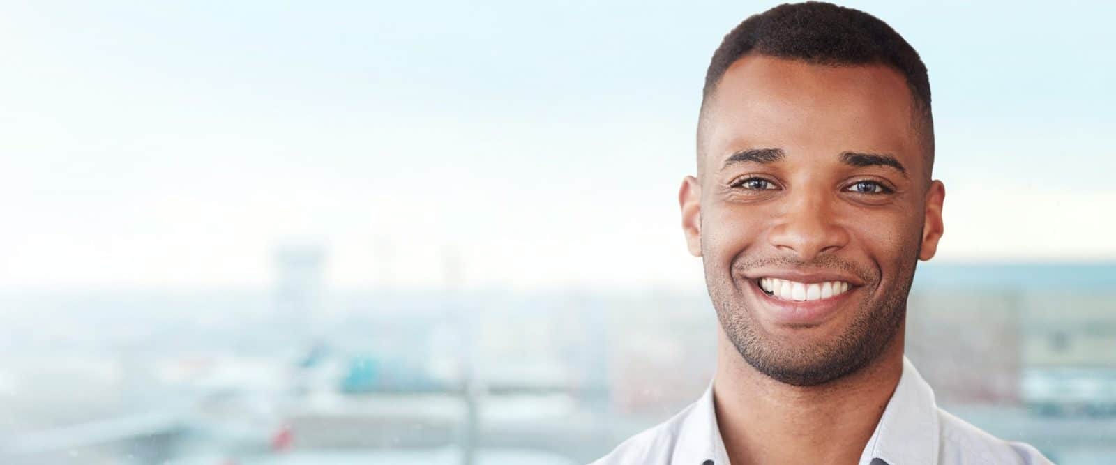 Man smiling who has been through fear of flying course