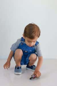 child playing with a toy