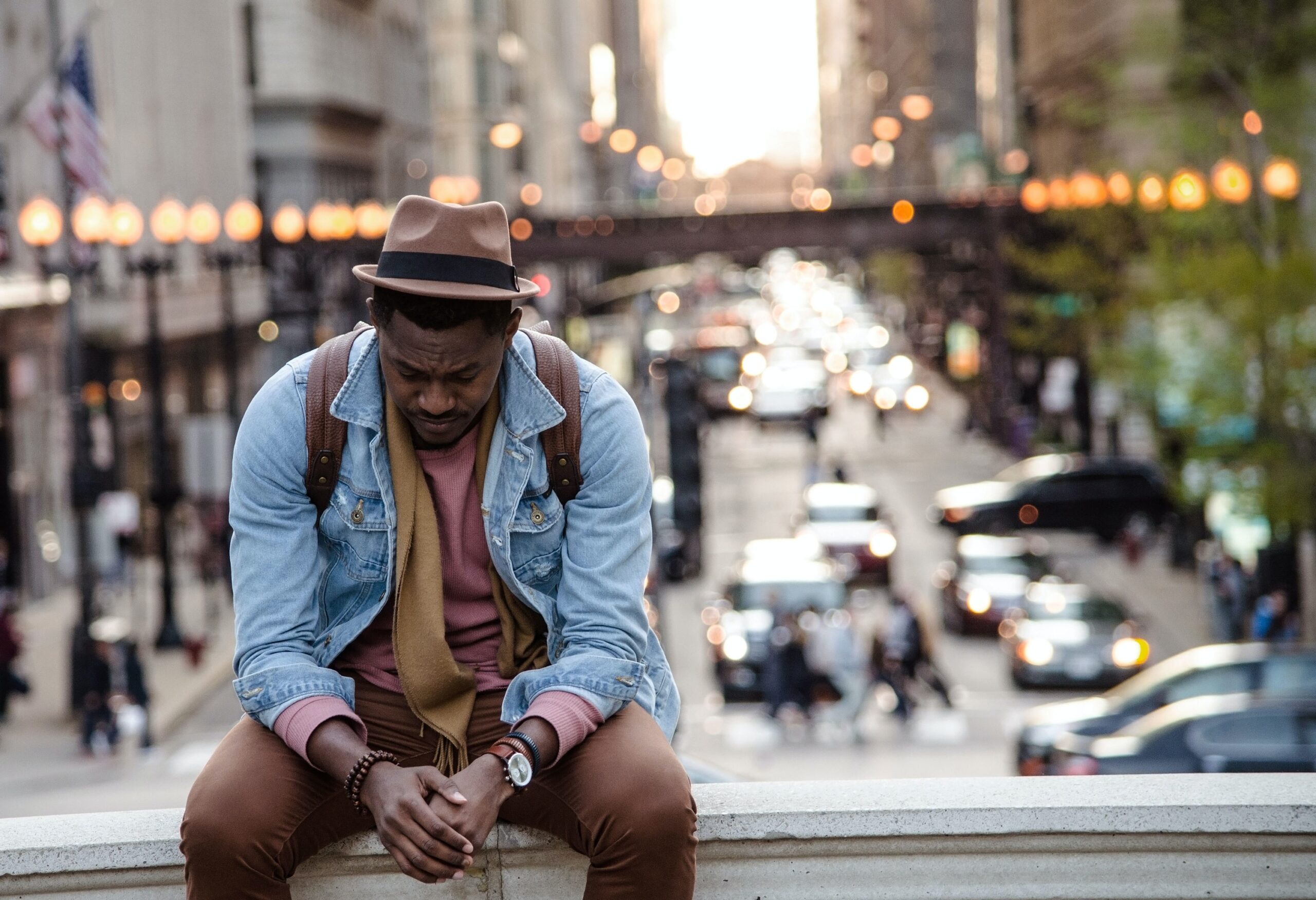 depressed man sitting down